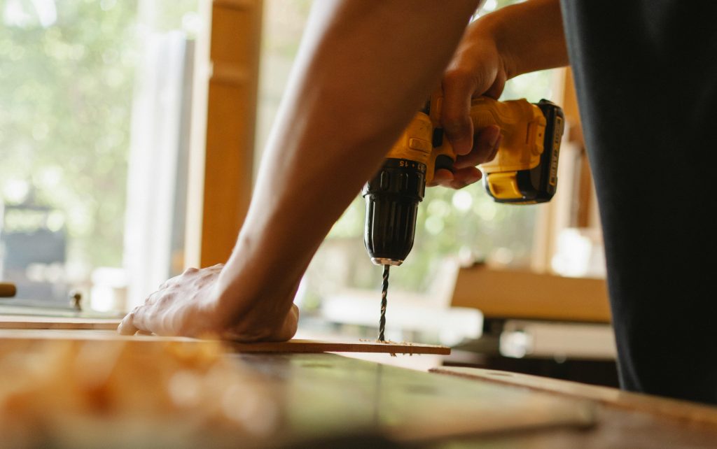 Construction worker drilling